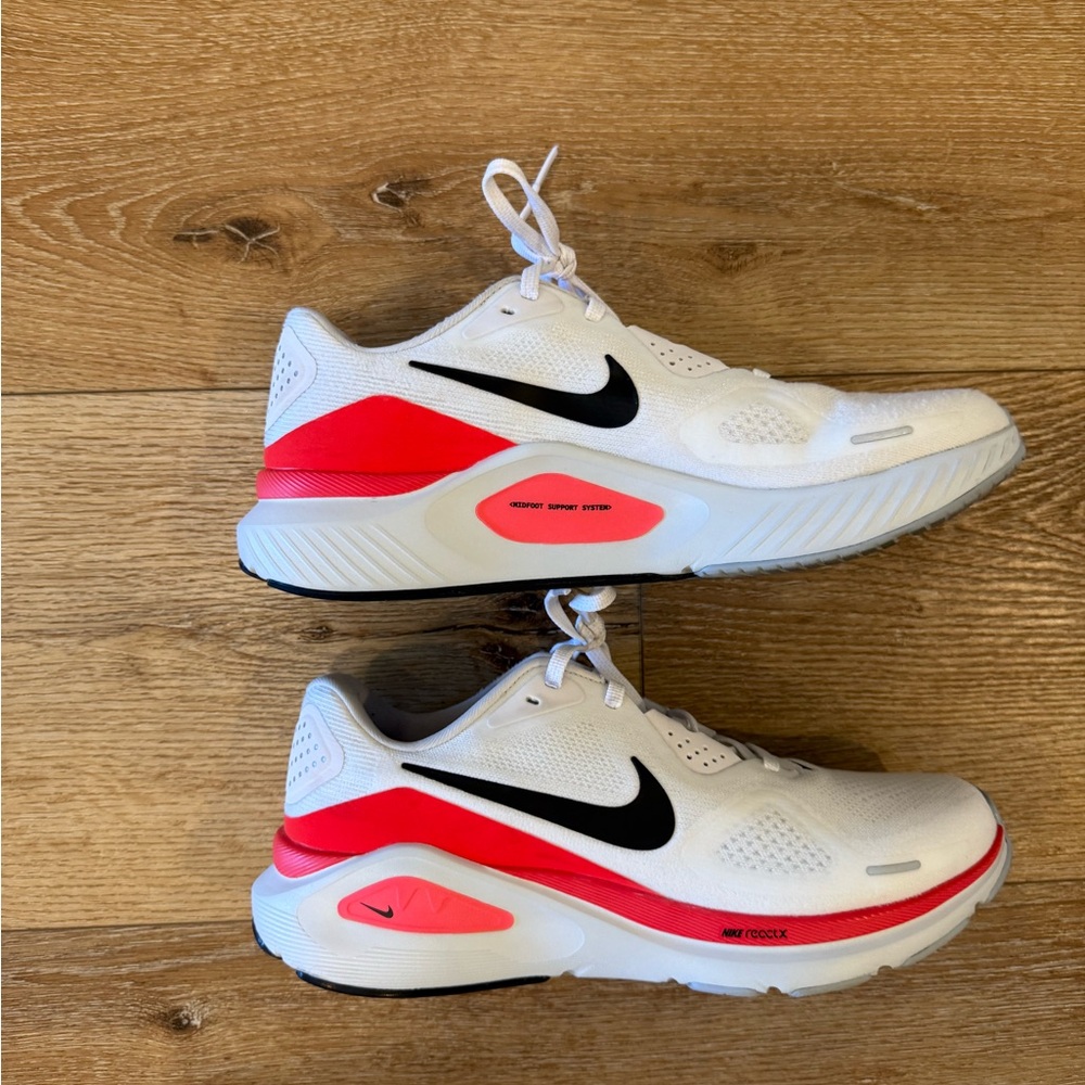 Nike White Athletic Shoes with Black Swoosh and Red Accents
